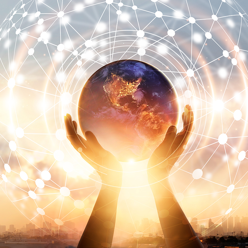 Hands lifting up globe