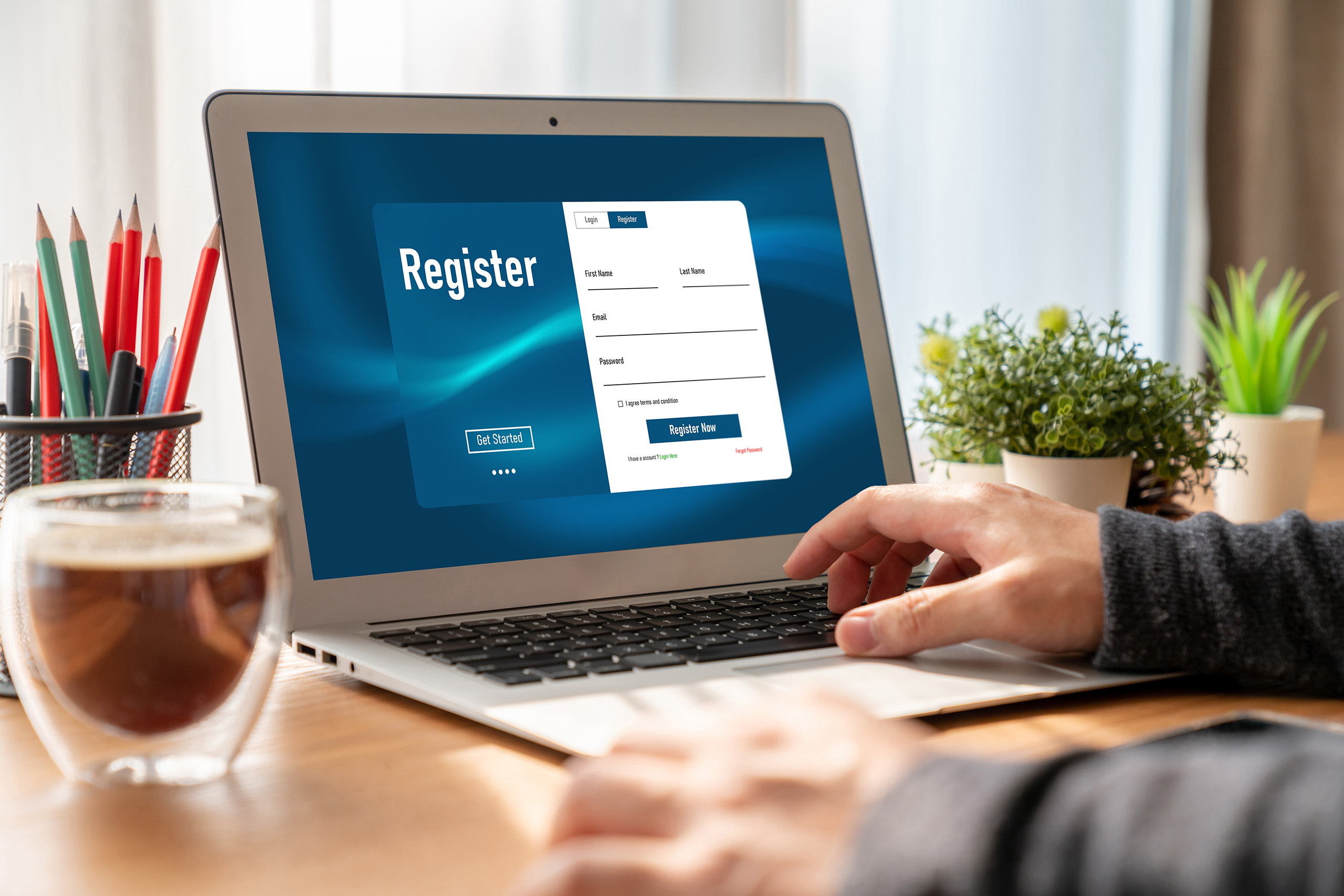 person registering laptop