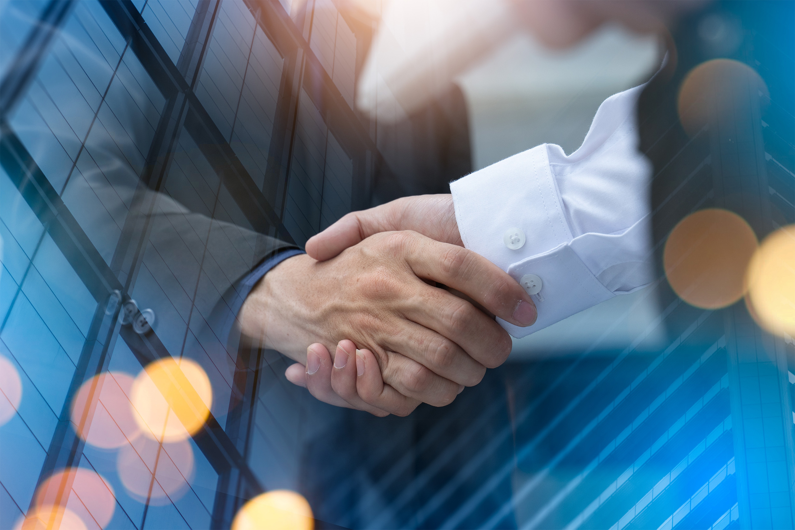 closeup of business handshake with bokeh